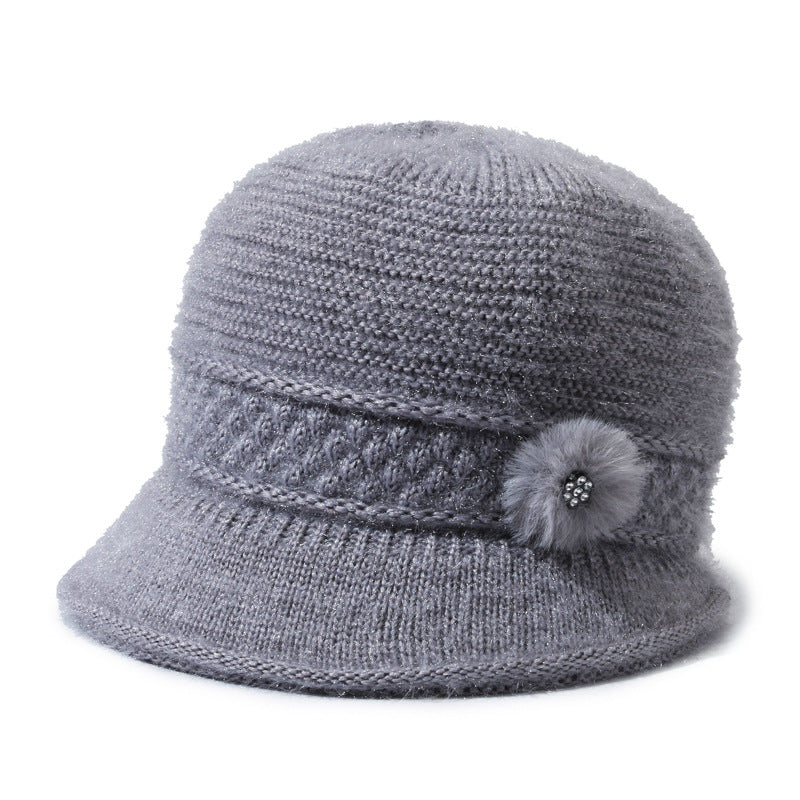 女性用冬用暖かいフリース帽子、ニット素材で作られています